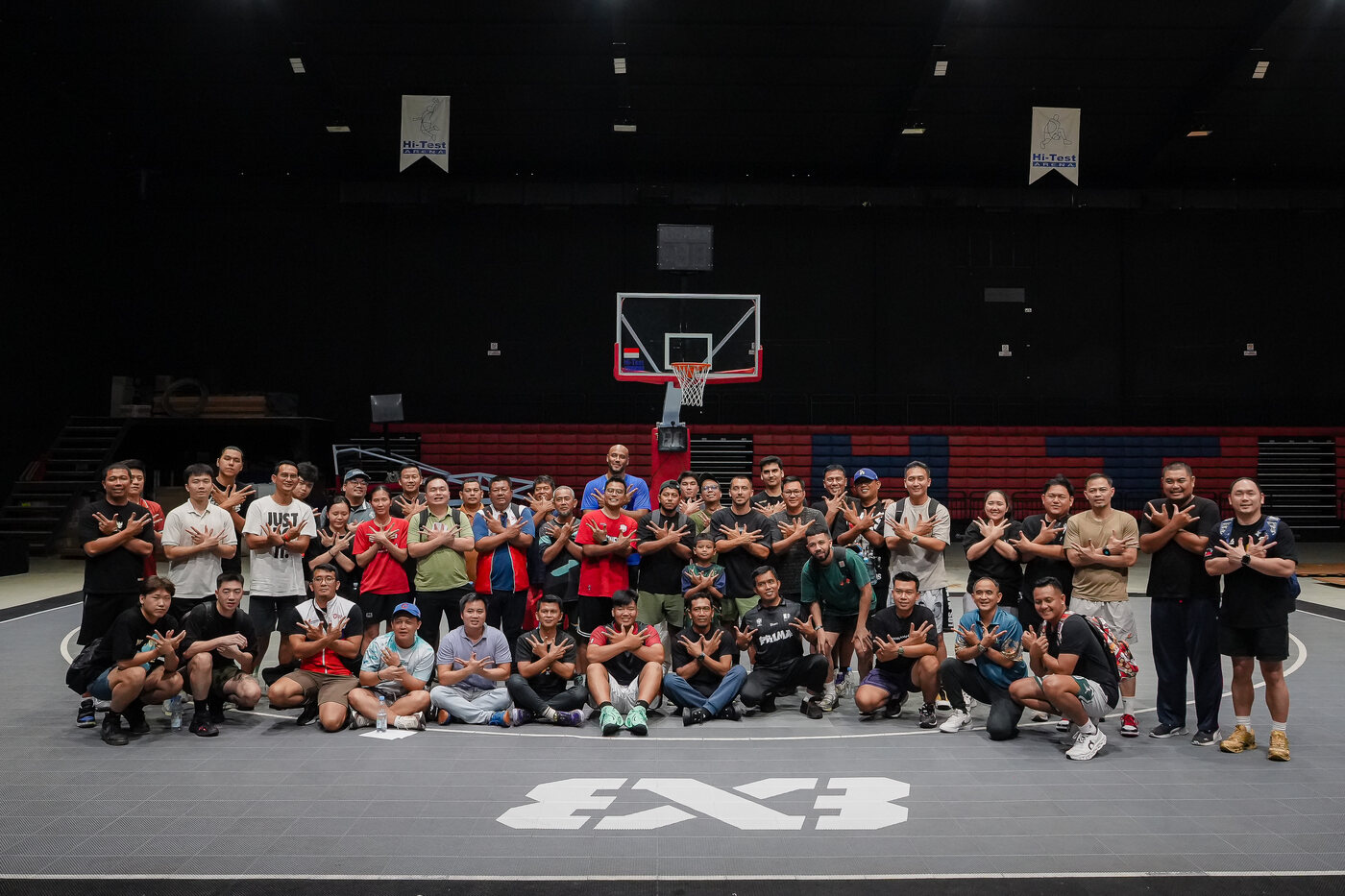 Coaches group photo on the 3x3 court